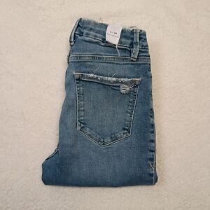 Good American Distressed Light Blue Jeans